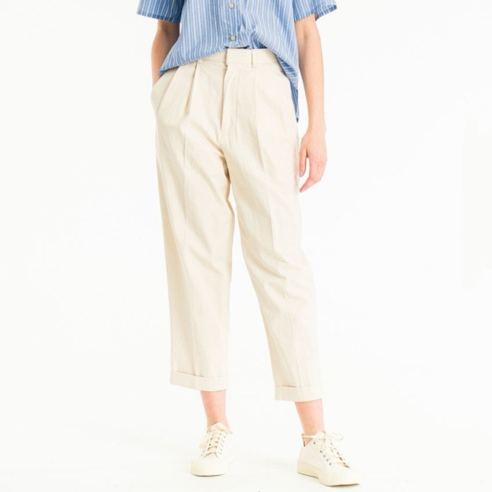 Women’s cream colored pleated trousers